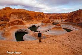 Exploring the Hidden Gem: Reflection Canyon is the name of the artwork.